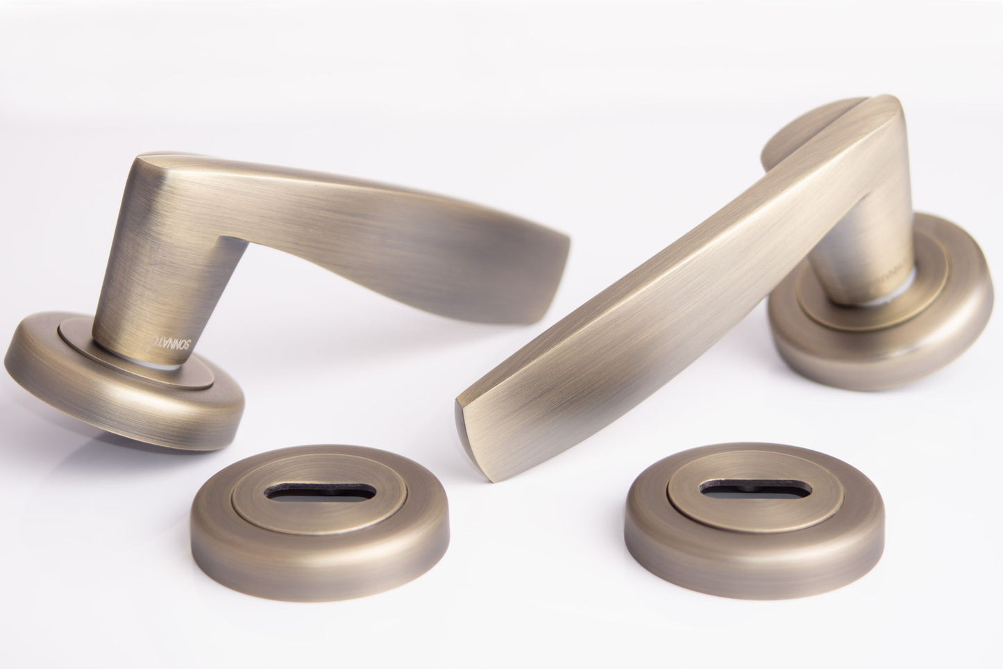 SONNATO MONZA MATT ANODISED BRONZE LEVER ON ROSE HANDLES